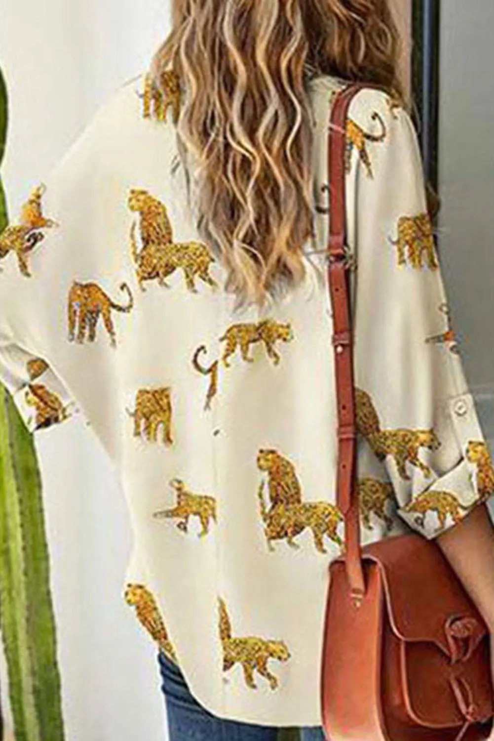 Apricot Printed Leopard Print Tab Sleeve Loose Fit V Neck Blouse sold by Beagle Boutique product image thumbnail 2