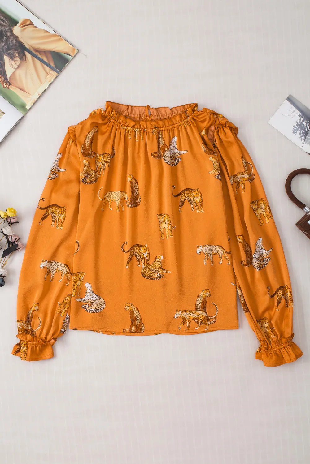 Orange Cheetah Printed Ruffled Sleeve Blouse sold by Beagle Boutique product image thumbnail 3