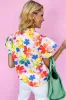 White Floral Bouquet Flutter Top sold by Beagle Boutique