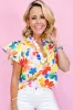 White Floral Bouquet Flutter Top sold by Beagle Boutique