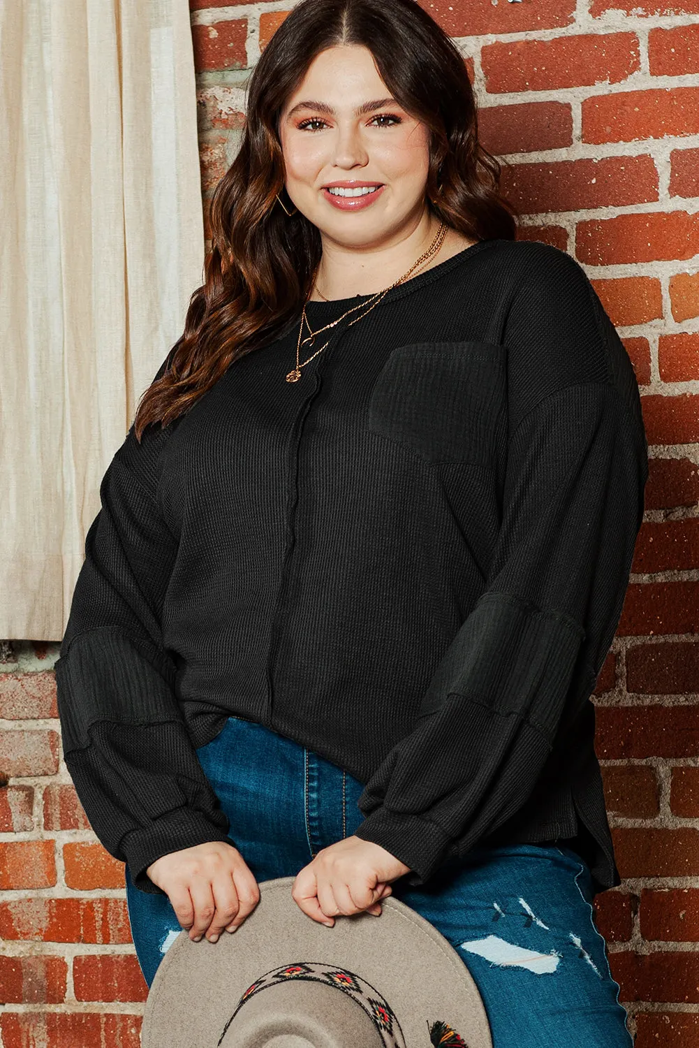 Black Plus Size Exposed Seam Crinkle Patchwork Top sold by Beagle Boutique