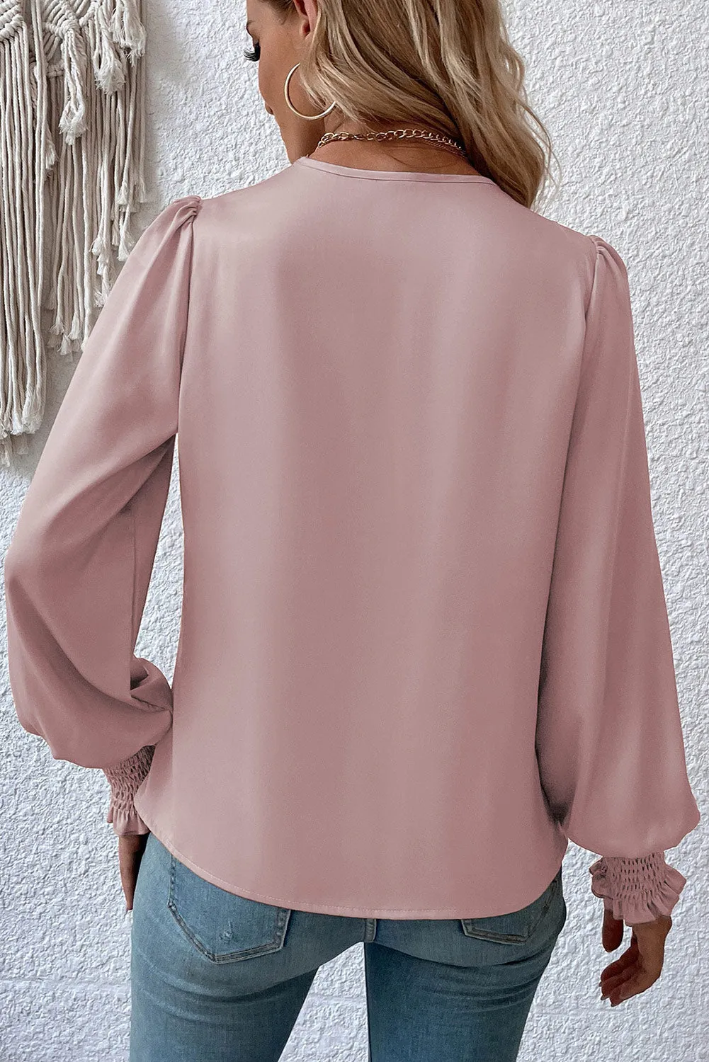 Black Solid Surplice Neck Shirred Cuffs Draped Blouse sold by Beagle Boutique product image thumbnail 5