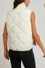 Beige Quilted High Neck Button Up Pocket Vest Coat sold by Beagle Boutique