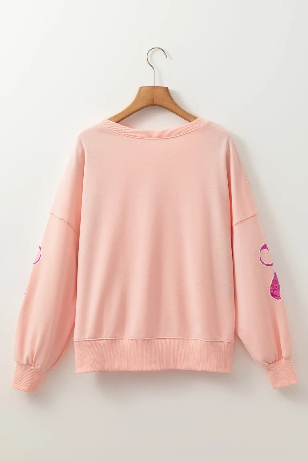 Apricot Pink Sequined Bowknot Drop Shoulder Oversized Sweatshirt sold by Beagle Boutique product image thumbnail 5