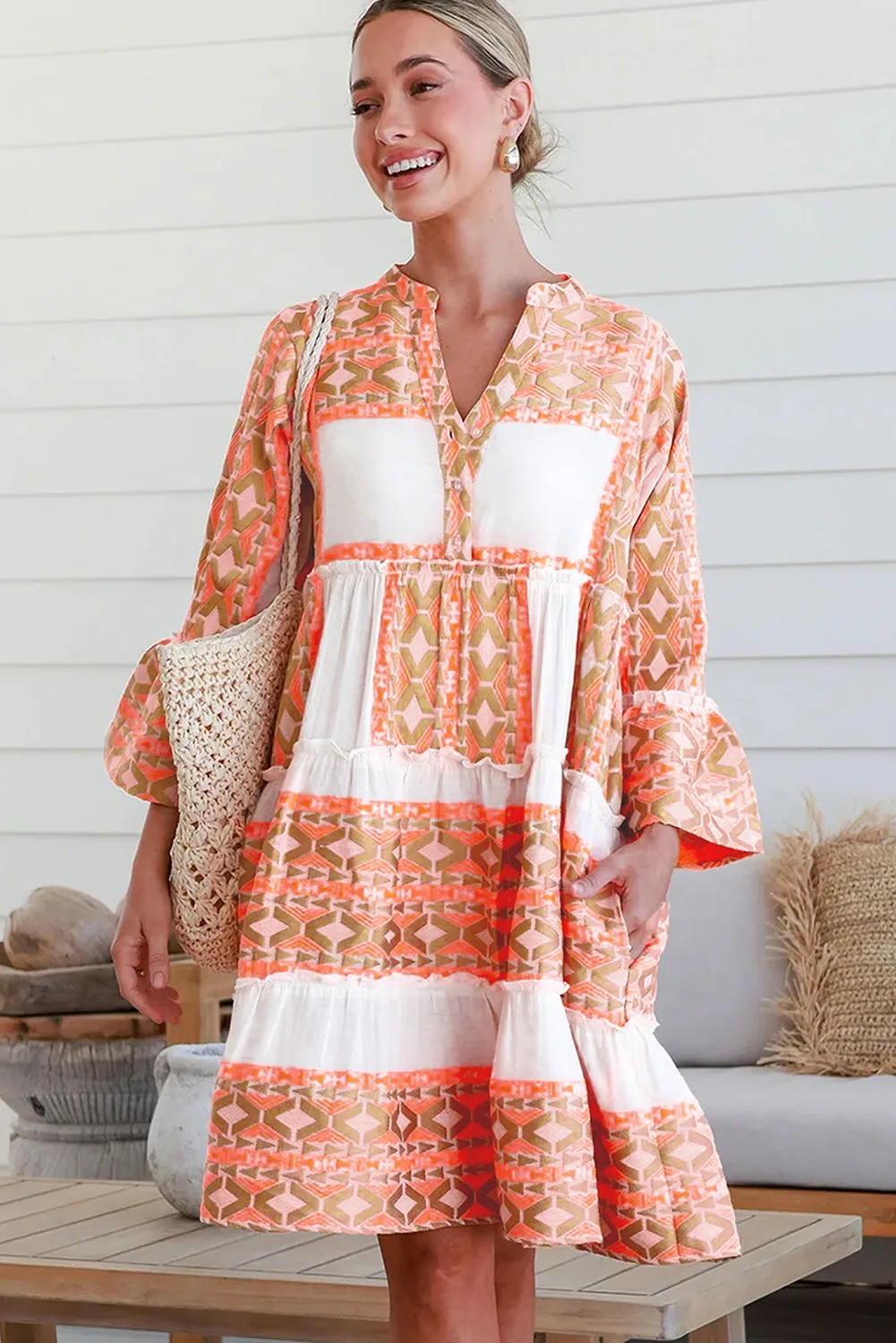 Orange Geometric Print Ruffle Tiered Button V Neck Dress sold by Beagle Boutique product image thumbnail 2