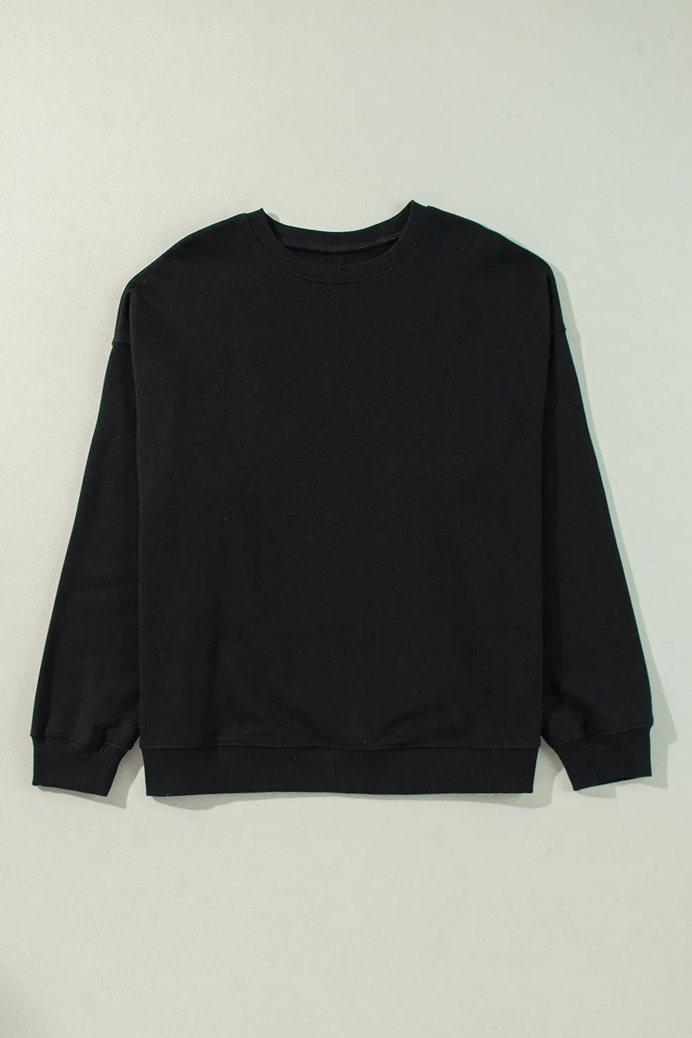 Black Solid Crew Neck Drop Shoulder Plus Size Sweatshirt sold by Beagle Boutique product image thumbnail 3
