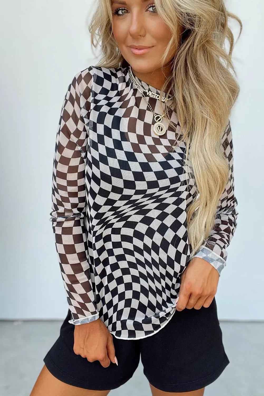 Black Checkered Pattern Mesh Mock Neck Long Sleeve Top sold by Beagle Boutique product image thumbnail 3