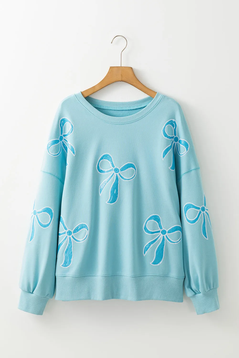 Beau Blue Sequined Bowknot Drop Shoulder Oversized Sweatshirt sold by Beagle Boutique product image thumbnail 4