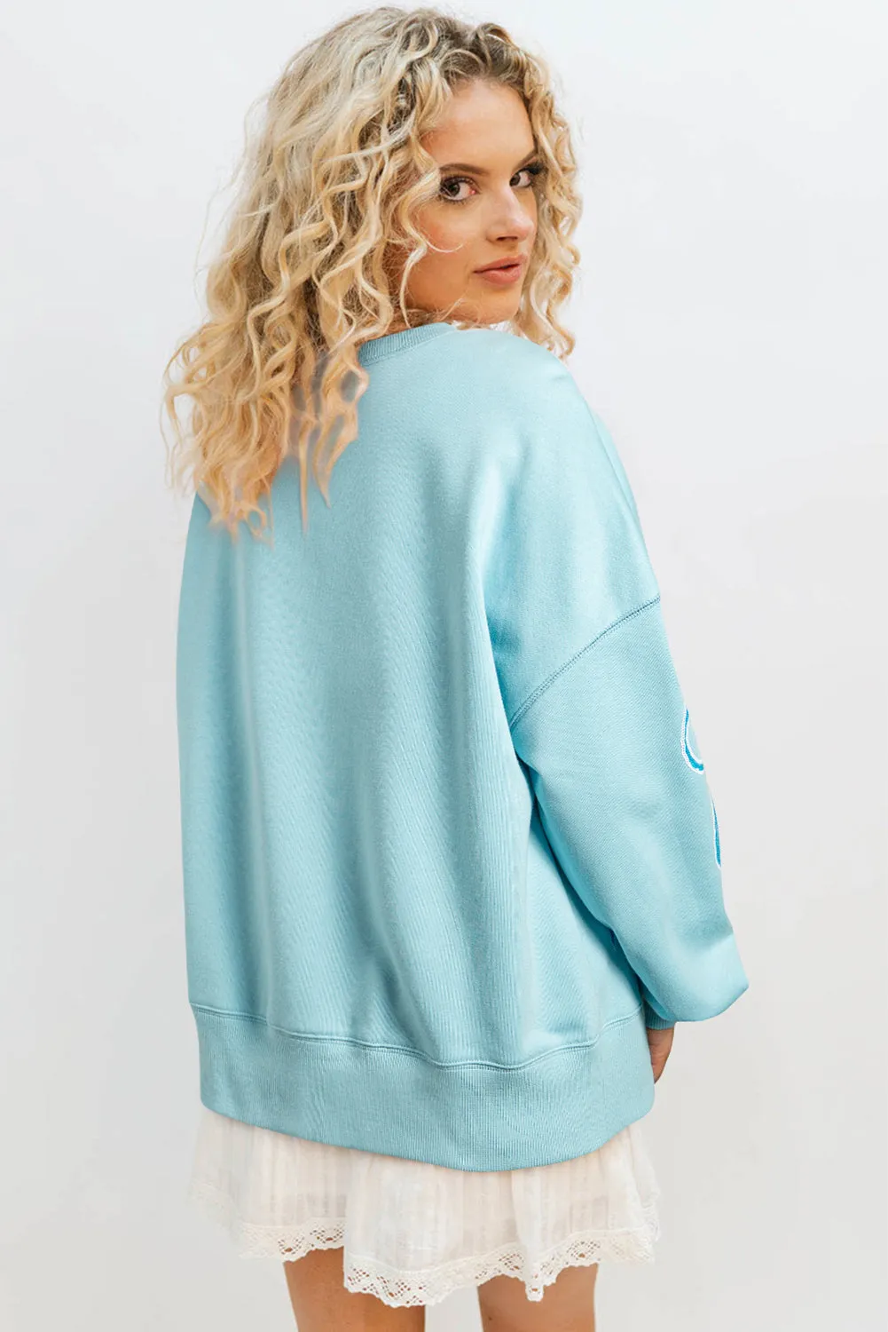 Beau Blue Sequined Bowknot Drop Shoulder Oversized Sweatshirt sold by Beagle Boutique product image thumbnail 2