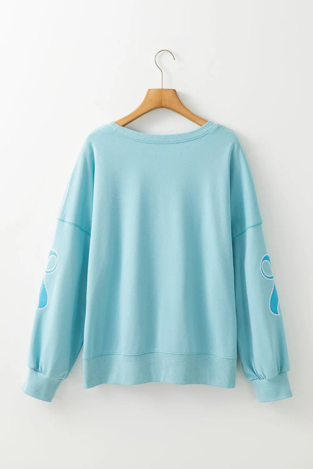 Beau Blue Sequined Bowknot Drop Shoulder Oversized Sweatshirt sold by Beagle Boutique product image thumbnail 5