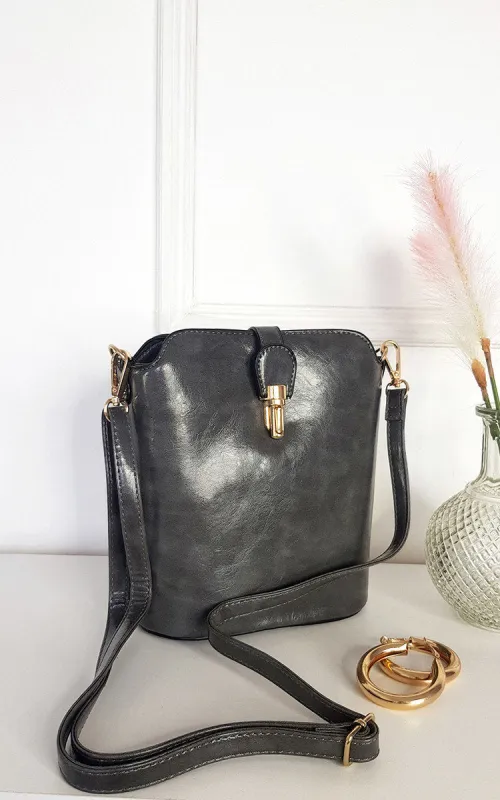 Faux Leather Crossbody Bag with Gold Detail and Adjustable Strap sold by Beagle Boutique