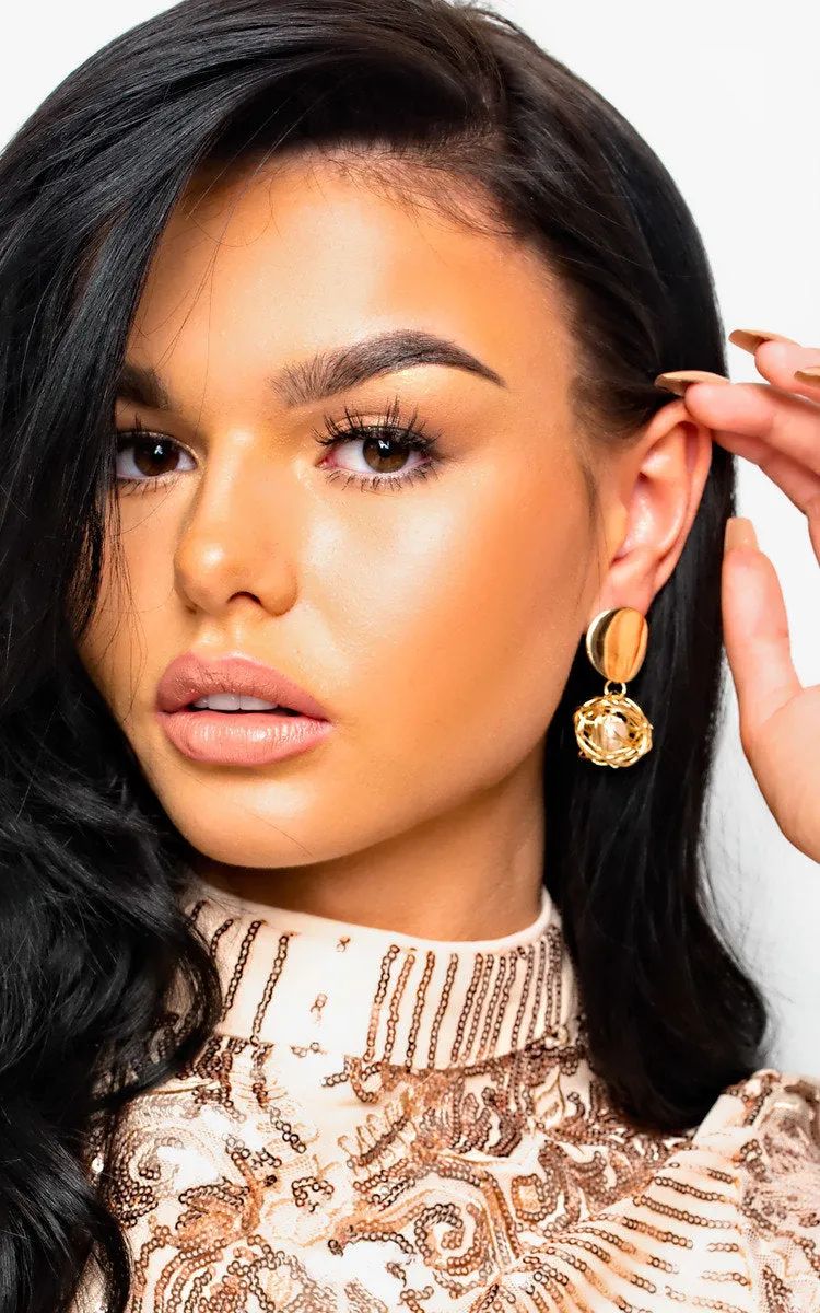 Caged Pearl Drop Earrings sold by Beagle Boutique