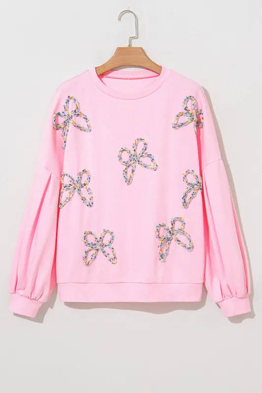 Light Pink Embroidered Bow Lantern Sleeve Oversized Pullover Sweatshirt sold by Beagle Boutique