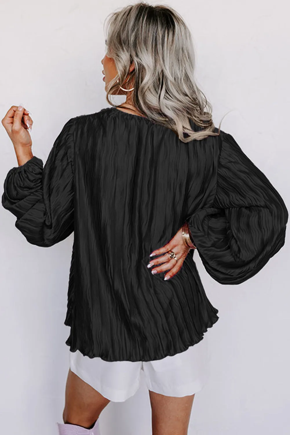 Black Textured Bubble Sleeve V Neck Loose Blouse sold by Beagle Boutique product image thumbnail 2
