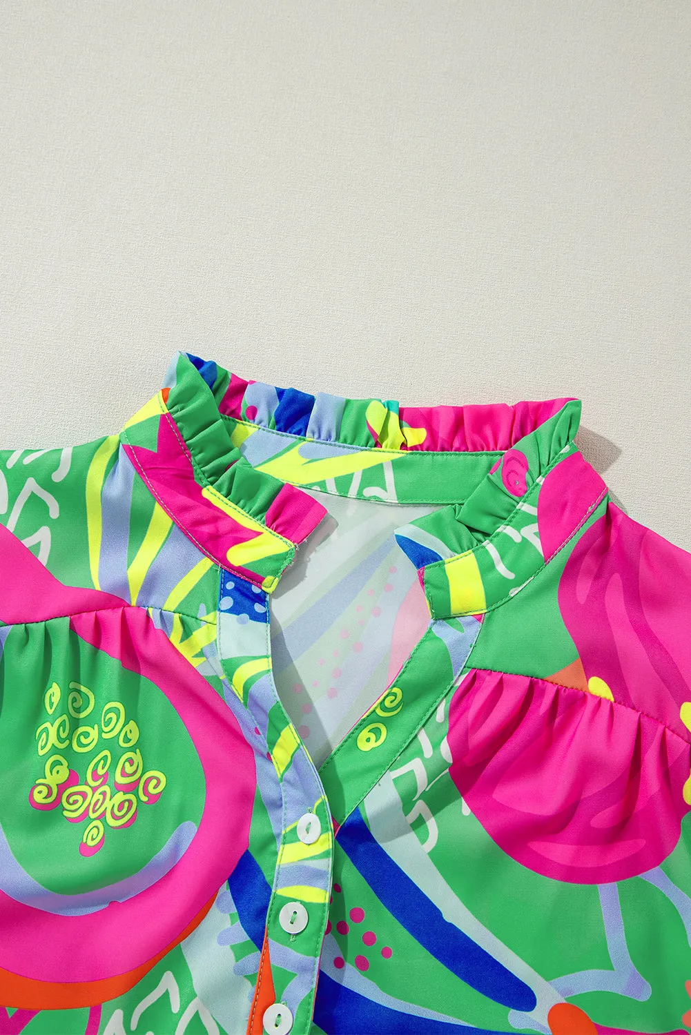 Black Abstract Print Ruffled Sleeve Buttoned V Neck Blouse sold by Beagle Boutique product image thumbnail 4