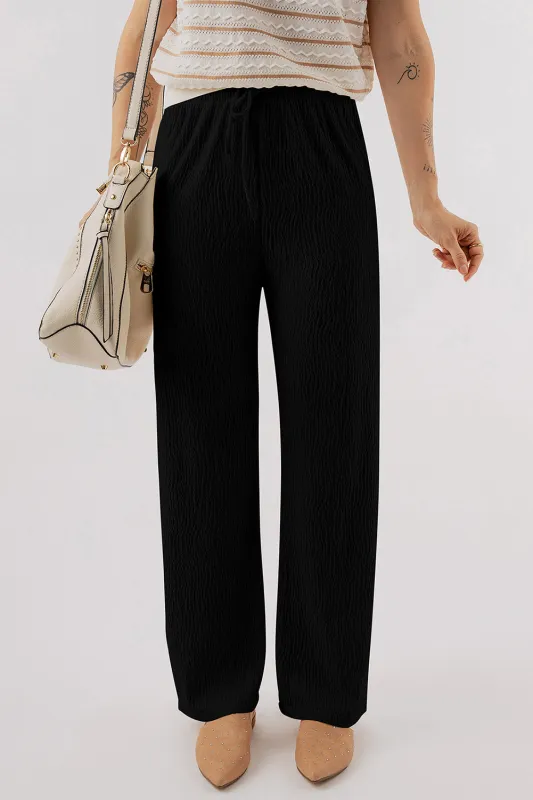 Black Textured Loose Drawstring Trousers made by Beagle Boutique