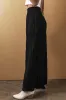 Black Textured Wide Smocked Waist Loose Trousers sold by Beagle Boutique