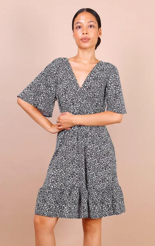 Flute Sleeve Mini Skater Dress In Black Floral Print sold by Beagle Boutique