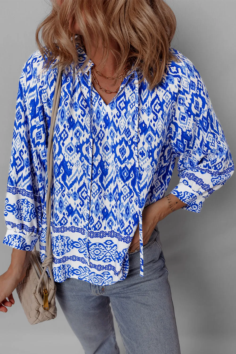 Blue Boho Printed 3/4 Sleeve Tied Neck Blouse sold by Beagle Boutique product image thumbnail 3