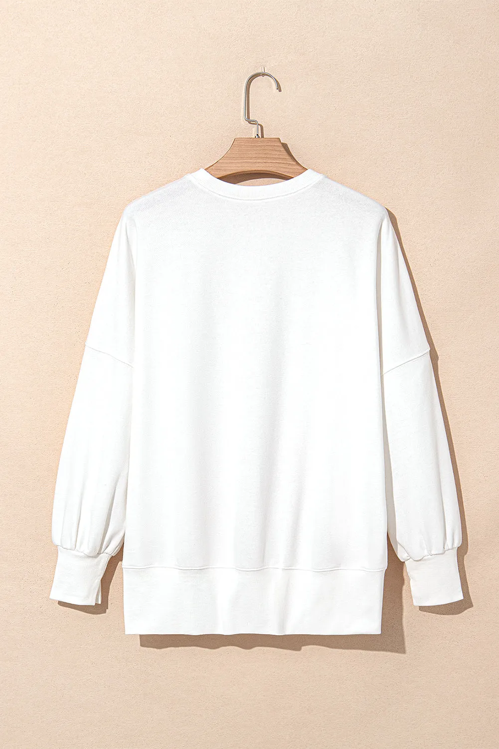White Sequin Bowknot High Low Oversize Sweatshirt sold by Beagle Boutique product image thumbnail 5