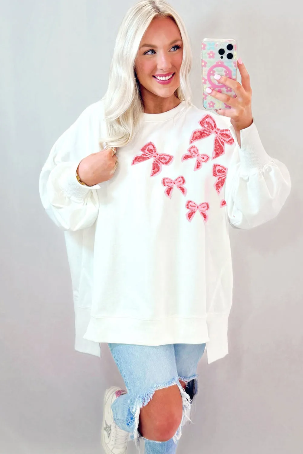 White Sequin Bowknot High Low Oversize Sweatshirt sold by Beagle Boutique product image thumbnail 3