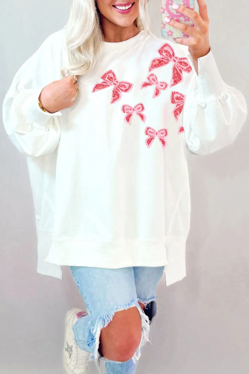 White Sequin Bowknot High Low Oversize Sweatshirt sold by Beagle Boutique