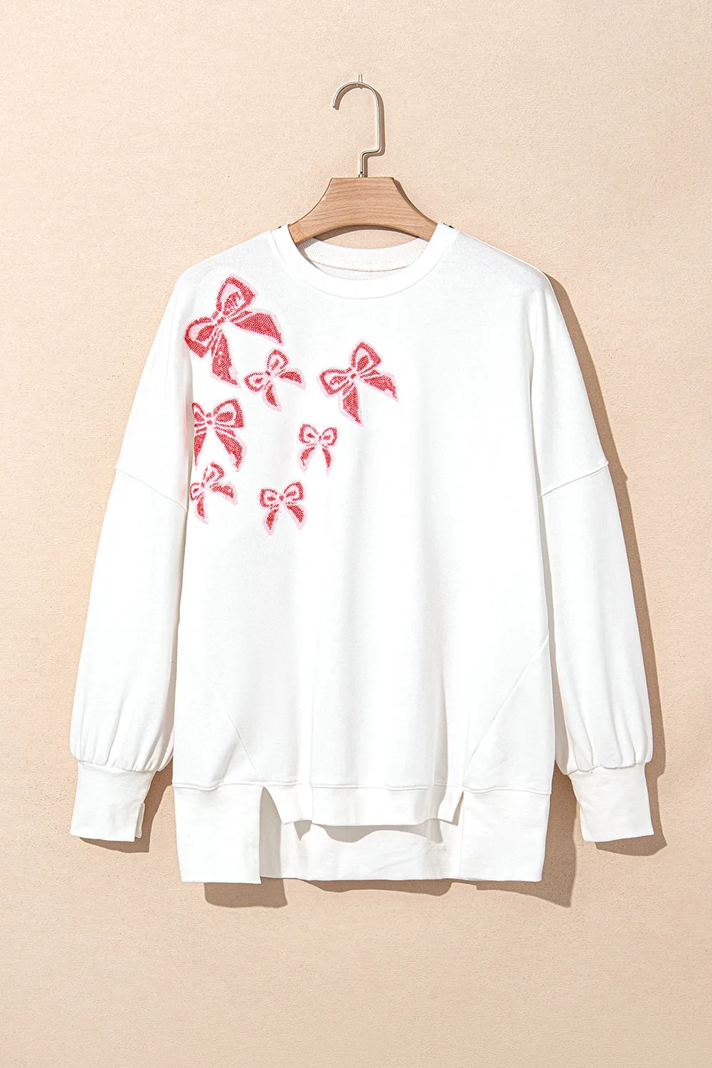 White Sequin Bowknot High Low Oversize Sweatshirt sold by Beagle Boutique product image thumbnail 4