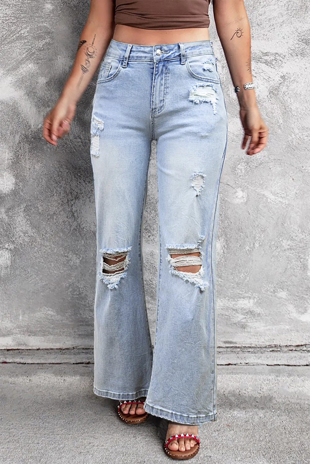 Light Wash Distressed Flare Jeans sold by Beagle Boutique