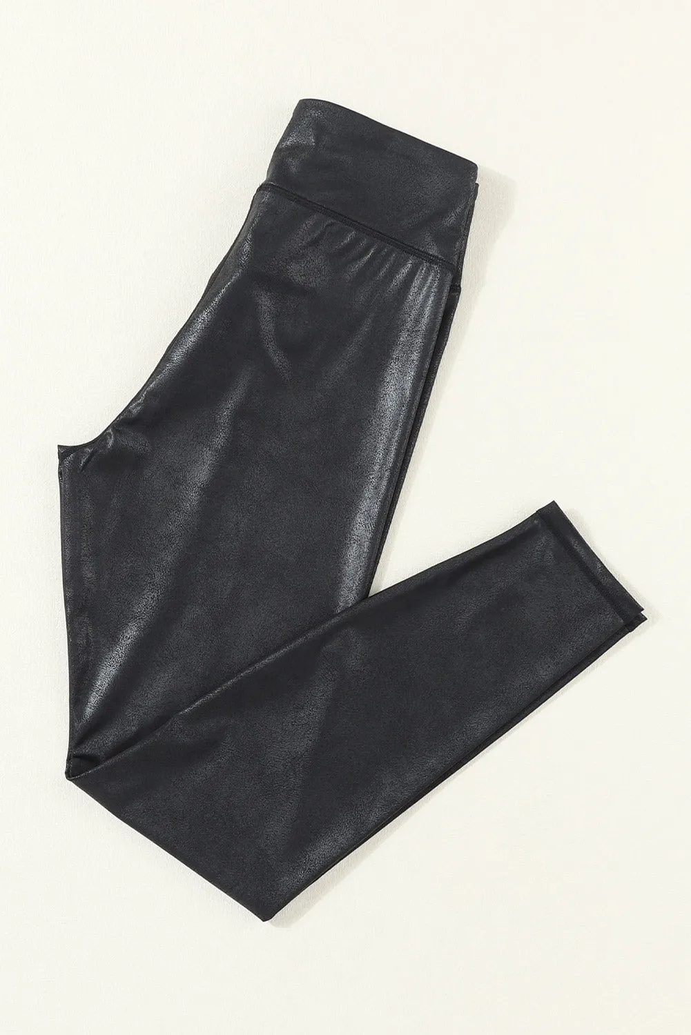Black Crossed Dip Waist Sleek Leather Leggings sold by Beagle Boutique