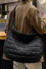 Black Quilted Zipper Large Shoulder Bag sold by Beagle Boutique