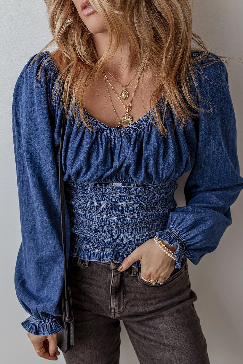 Dark Blue Smocked Ruffled Puff Sleeve V Neck Denim Blouse sold by Beagle Boutique product image thumbnail 5