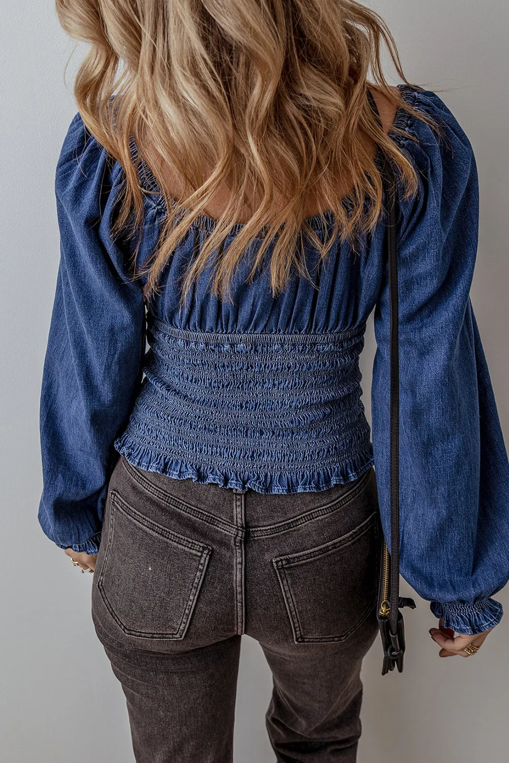 Dark Blue Smocked Ruffled Puff Sleeve V Neck Denim Blouse sold by Beagle Boutique product image thumbnail 2