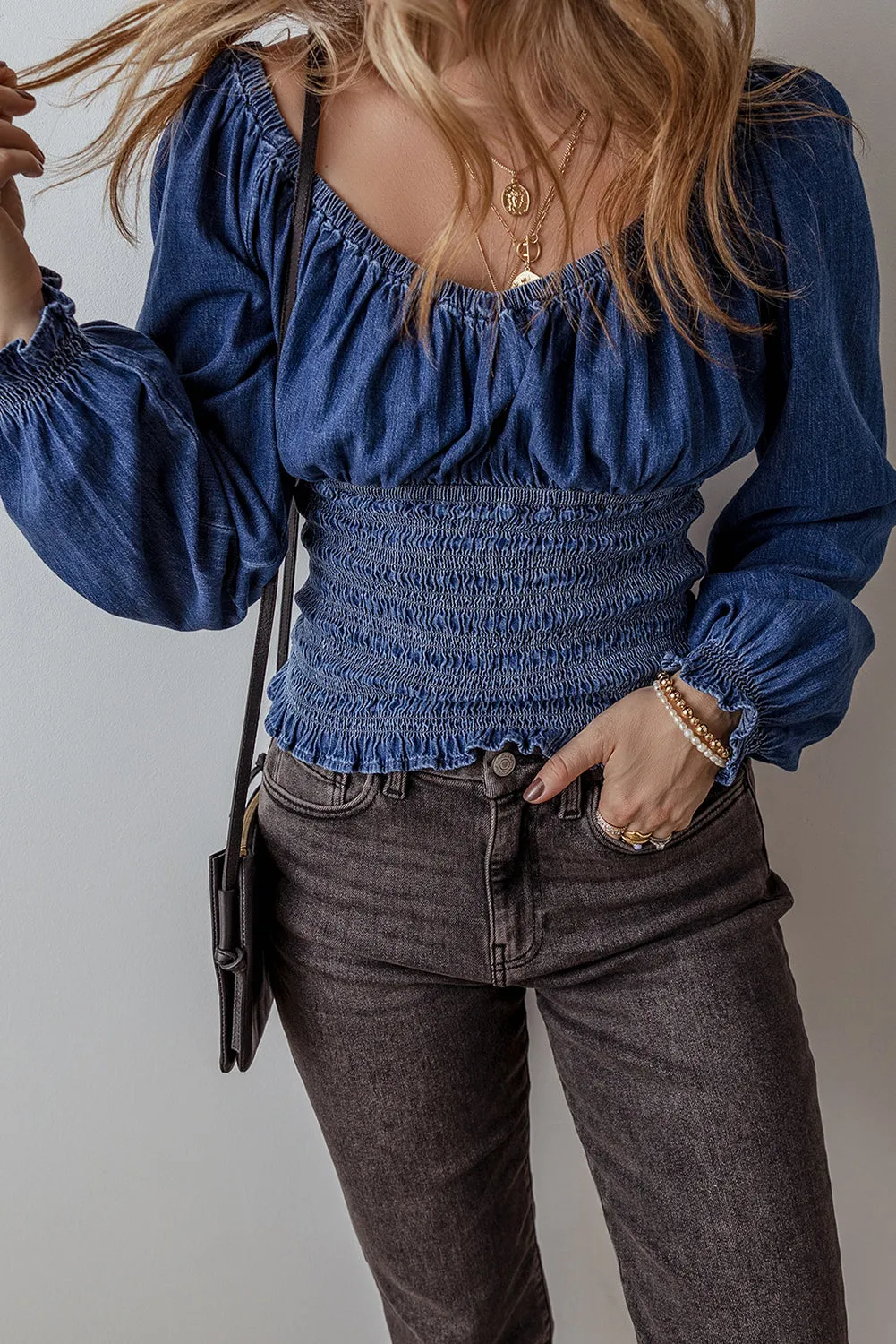 Dark Blue Smocked Ruffled Puff Sleeve V Neck Denim Blouse sold by Beagle Boutique product image thumbnail 4