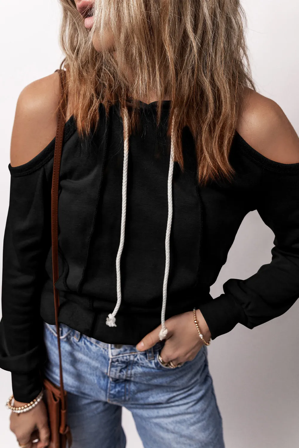 Black Exposed Seam Cold Shoulder Drawstring Hoodie sold by Beagle Boutique