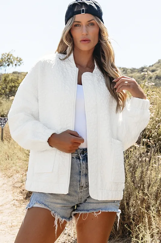 White Floral Quilted Jacket sold by Beagle Boutique