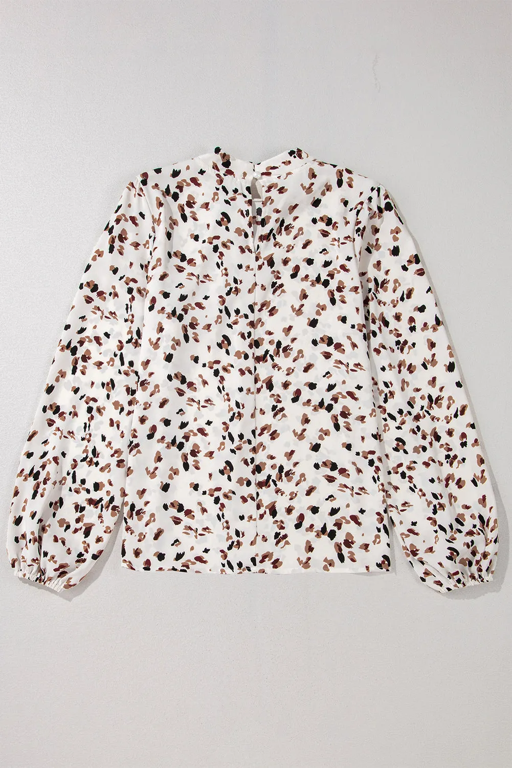 White Leopard Print Lantern Sleeve Mock Neck Pleated Blouse sold by Beagle Boutique product image thumbnail 5