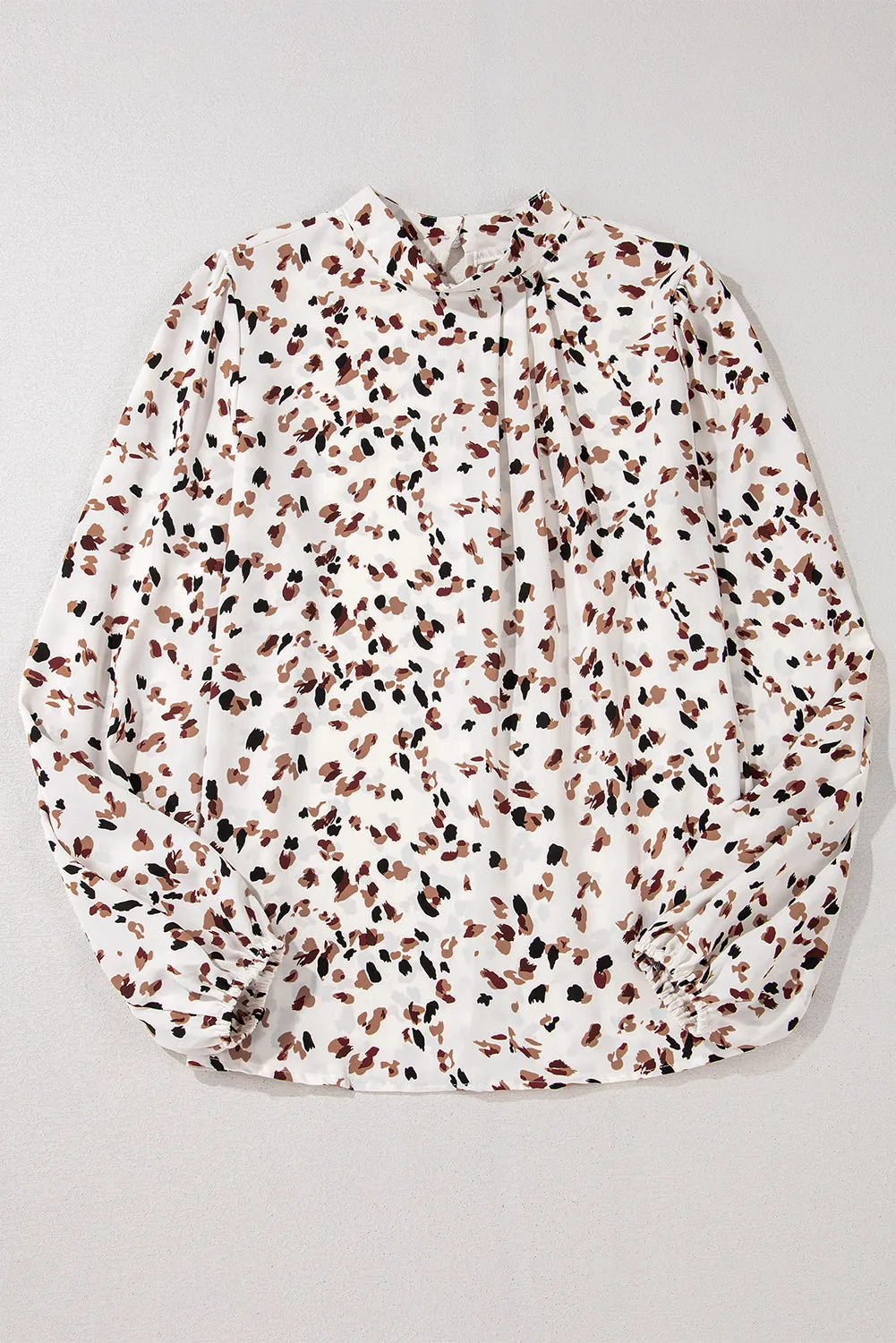 White Leopard Print Lantern Sleeve Mock Neck Pleated Blouse sold by Beagle Boutique product image thumbnail 4