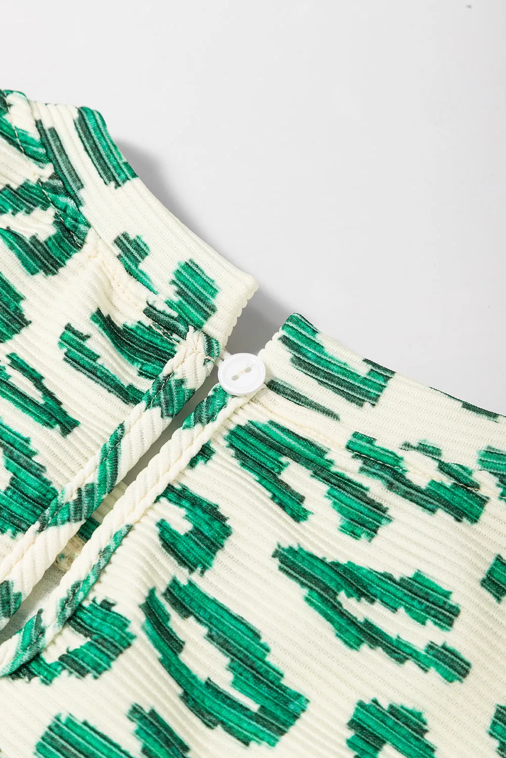 Green Leopard Print Mock Neck Puff Sleeve Top sold by Beagle Boutique product image thumbnail 4