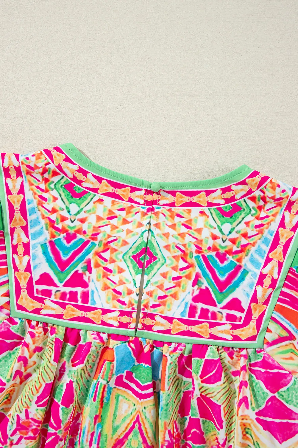Orange Geometric Print Long Sleeve Keyhole Back Blouse sold by Beagle Boutique product image thumbnail 5