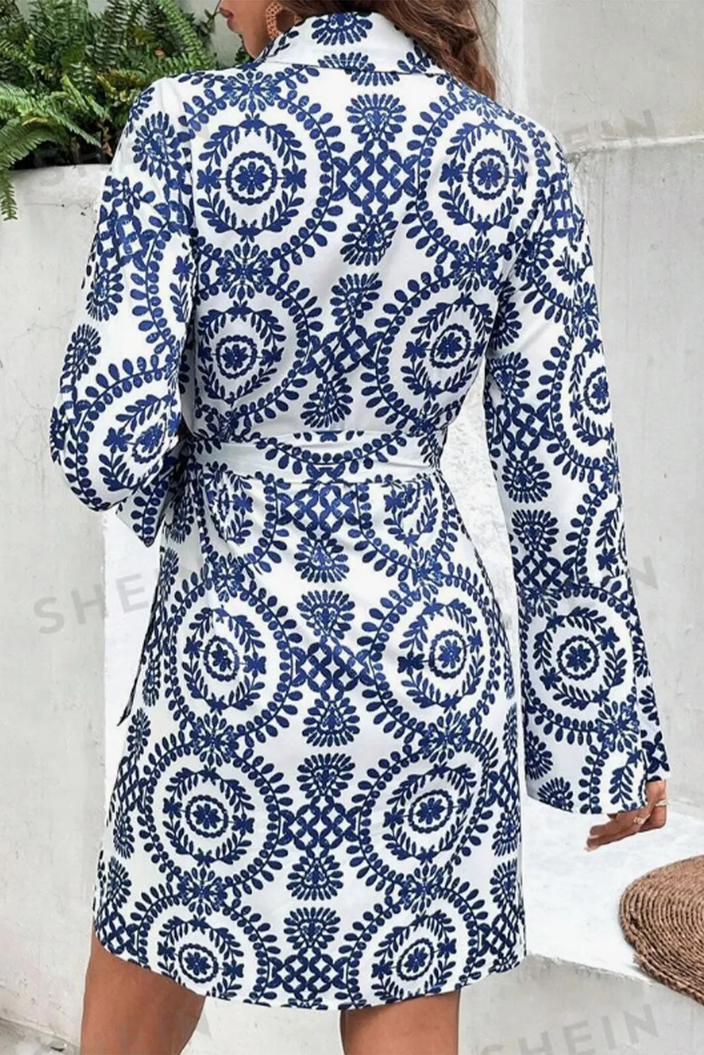 Blue Floral Print V Neck Wrapped Knot Long Sleeve Dress sold by Beagle Boutique product image thumbnail 2