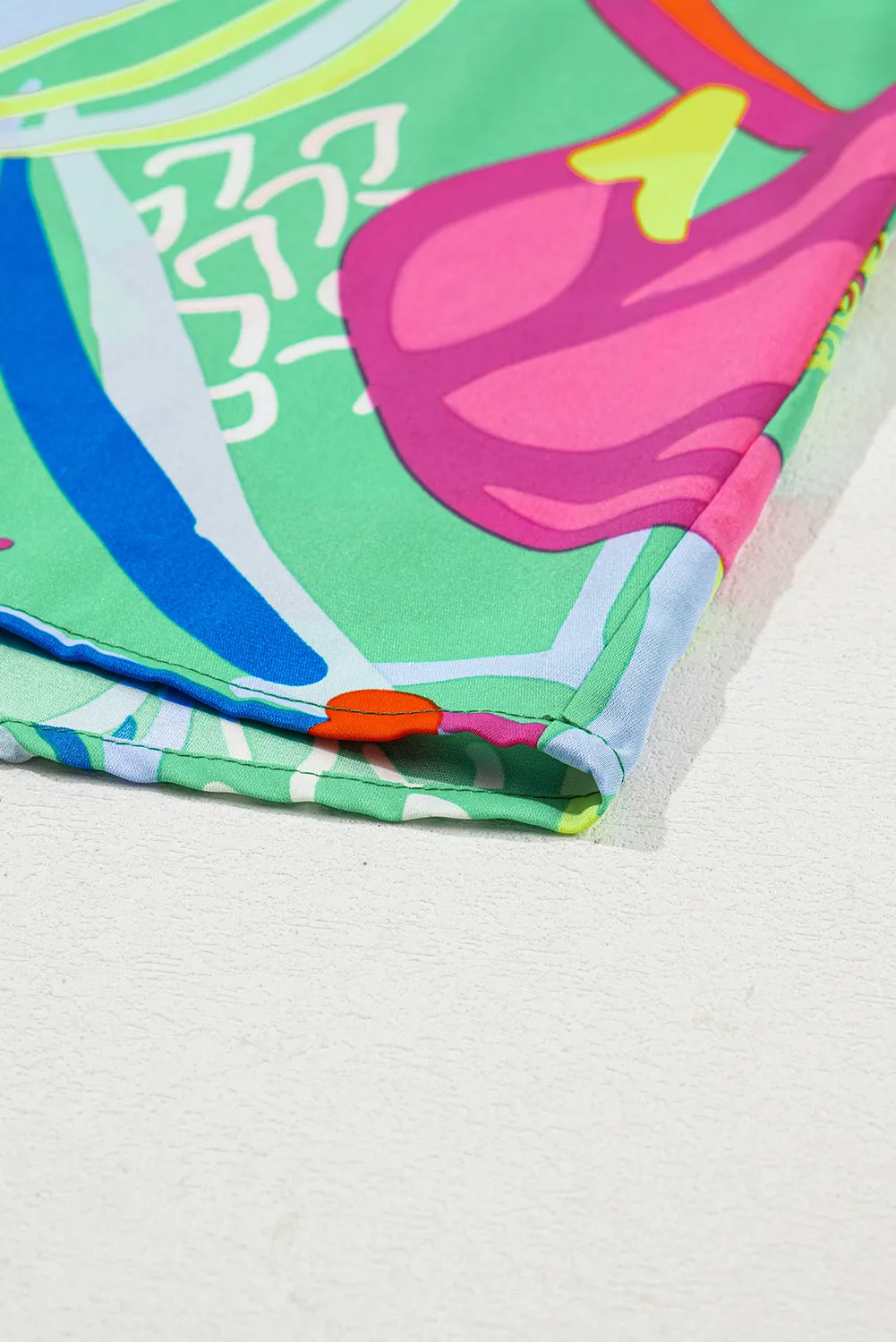 Green Abstract Printed Flounce Sleeve V Neck Buttoned Plus Size Blouse sold by Beagle Boutique product image thumbnail 5