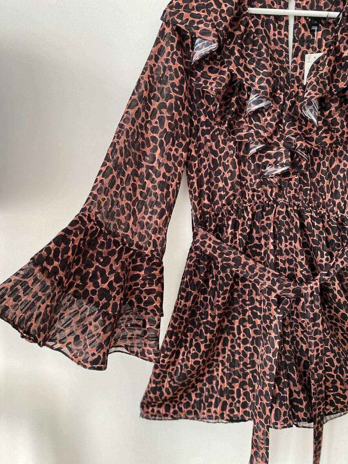 River Island Animal Print Ruffled Playsuit Sizes 12 sold by Beagle Boutique product image thumbnail 2