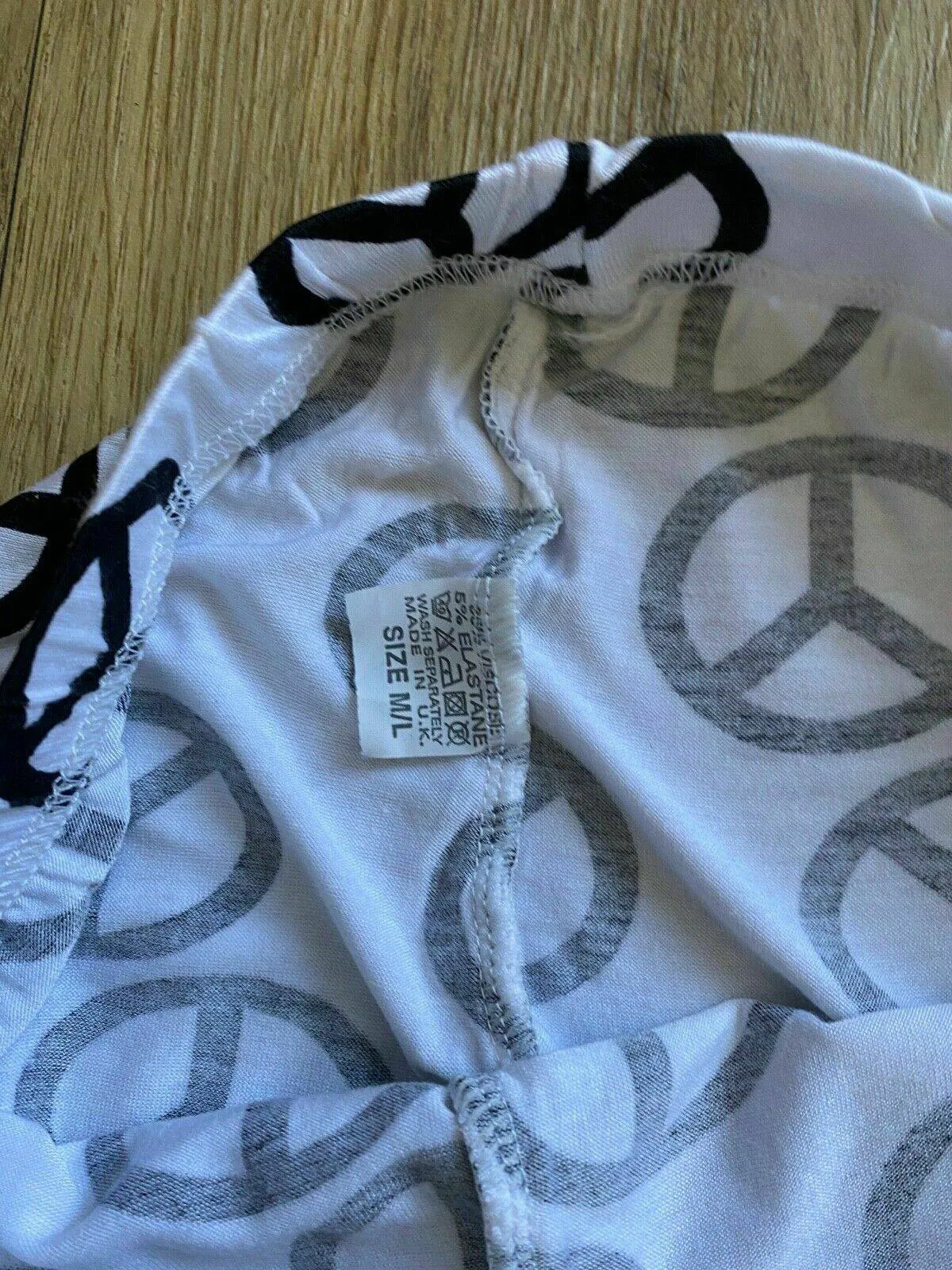 Peace Symbol White Leggings Size M/L 6 - 8 sold by Beagle Boutique product image thumbnail 2