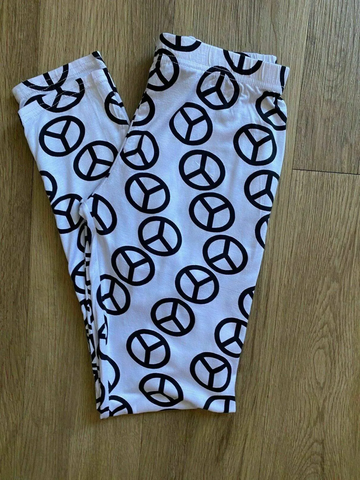 Peace Symbol White Leggings Size M/L 6 - 8 sold by Beagle Boutique product image thumbnail 3