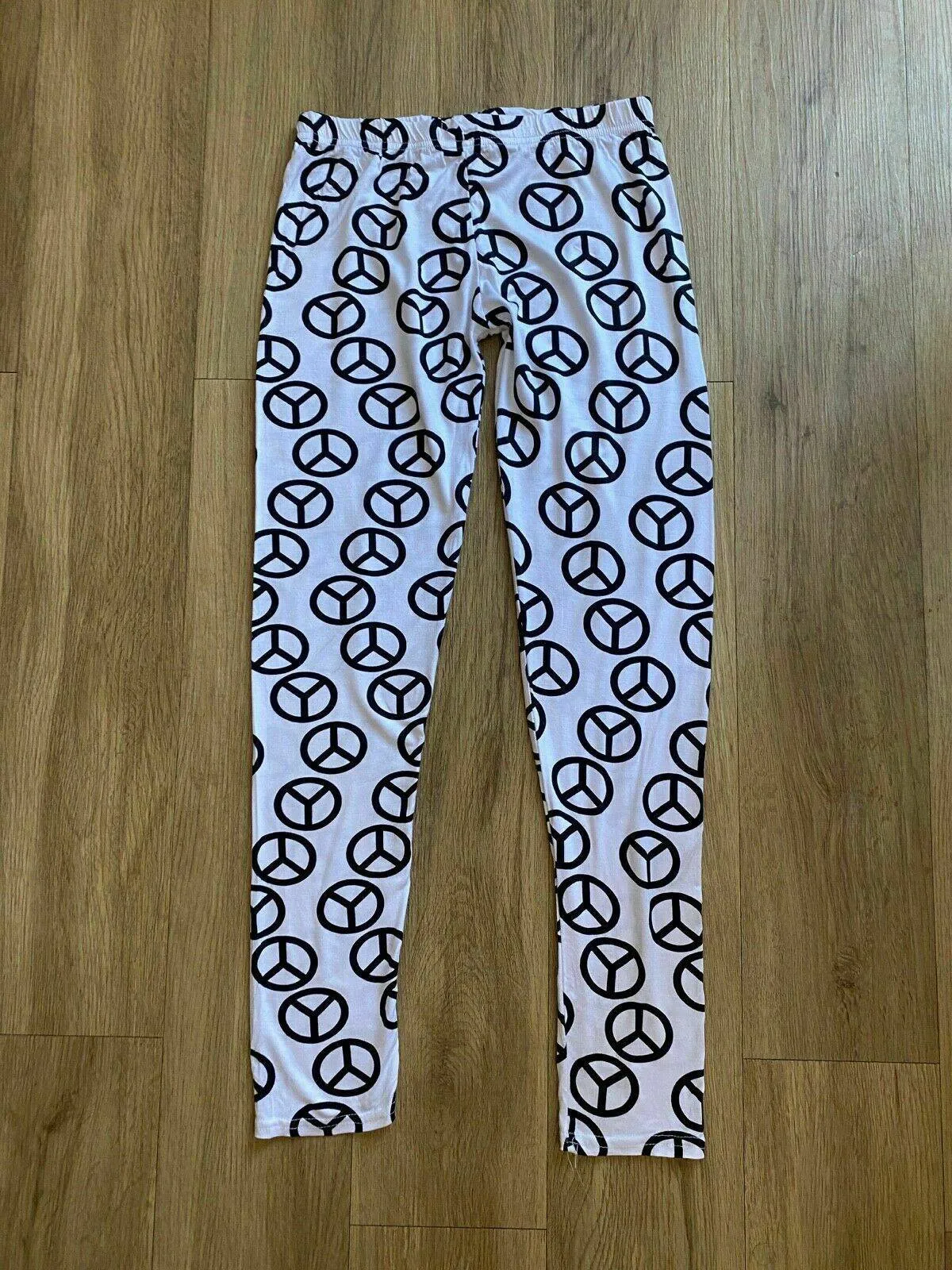 Peace Symbol White Leggings Size M/L 6 - 8 sold by Beagle Boutique