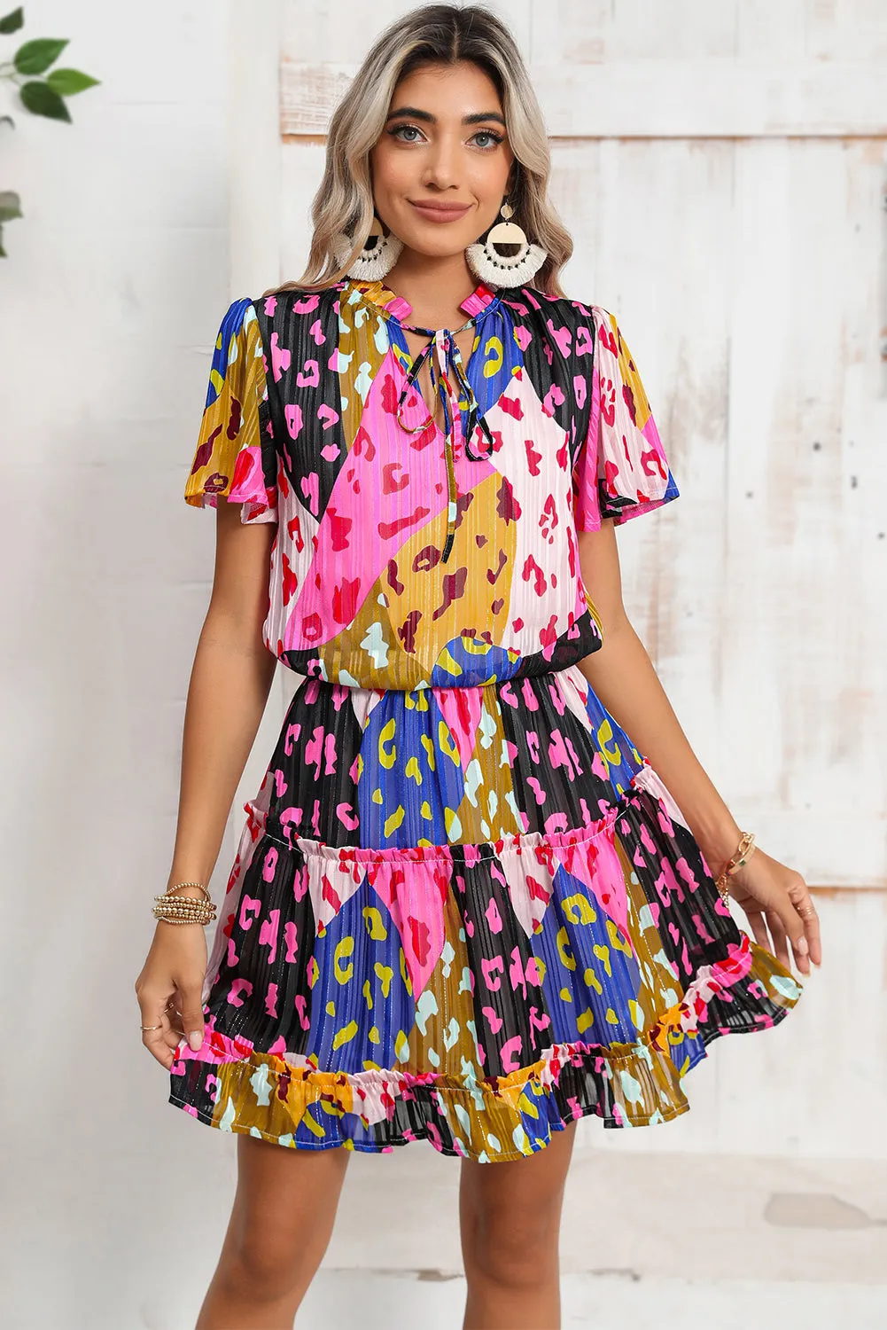 Rose Leopard Short Sleeve Tiered Ruffle Mini Dress sold by Beagle Boutique product image thumbnail 4