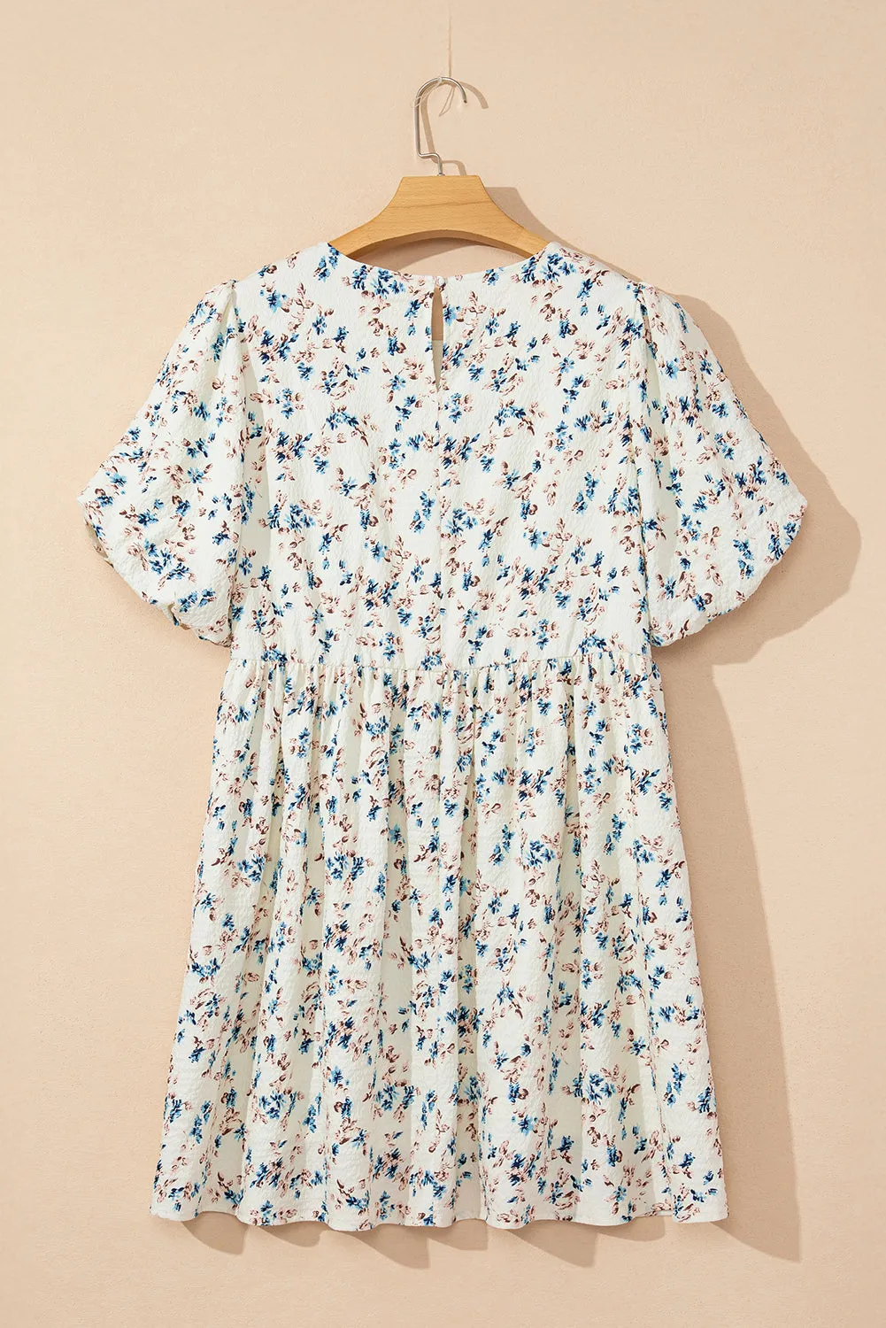 Floral Puff Short Sleeve Empire Waist Mini Dress sold by Beagle Boutique product image thumbnail 5