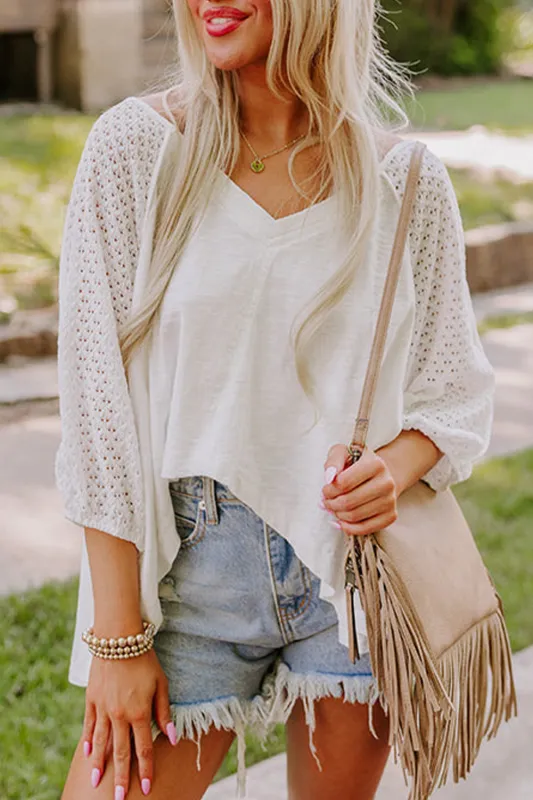 White Eyelet Patchwork High Low Hem V Neck Oversized Top sold by Beagle Boutique