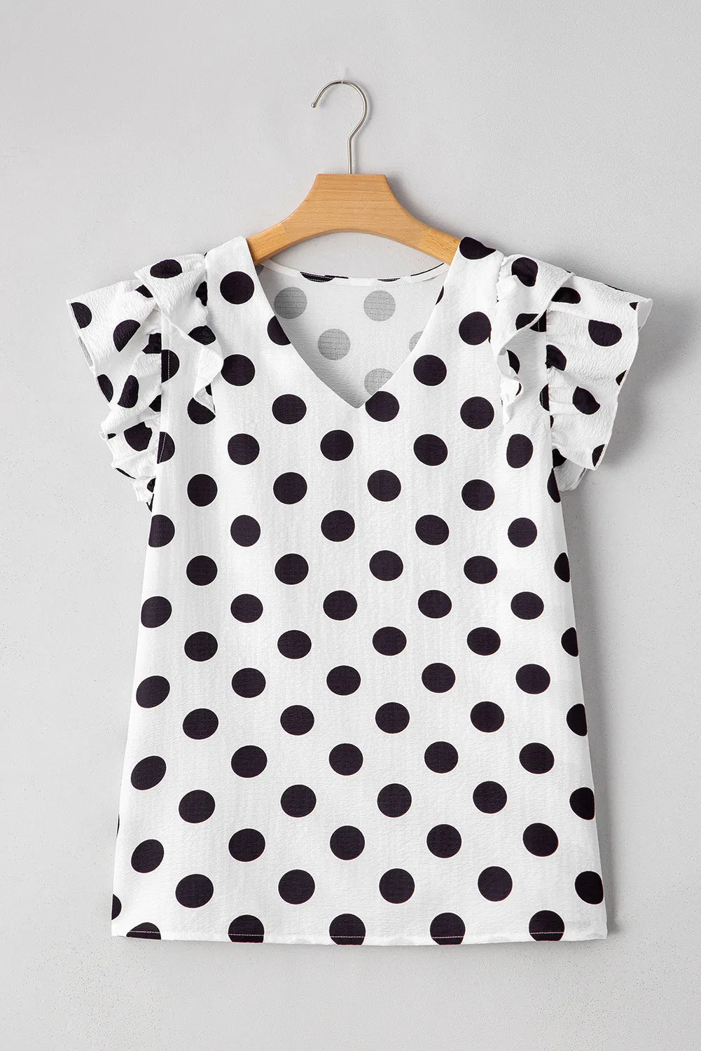 White Polka Dot Print Ruffled Sleeve V Neck Blouse sold by Beagle Boutique product image thumbnail 4