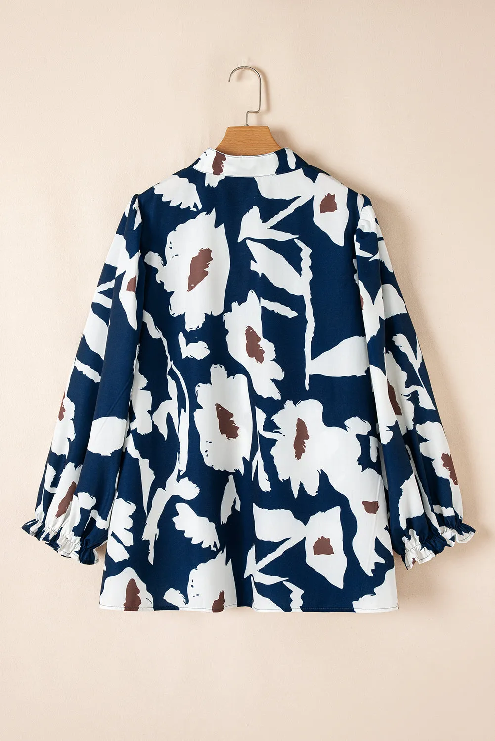 Sail Blue Abstract Floral Print Puff Sleeve Half Button Blouse sold by Beagle Boutique product image thumbnail 5